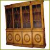 Na zdjęciu: model 37253 SBD Satinwood and marquetry Breakfront Bookcase by Restall Brown &amp; Clennell